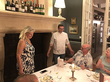 Margaret thanking our chef for another fabulous Farewell Dinner the 2018 June II Bordeaux Grand Cru Tour 
