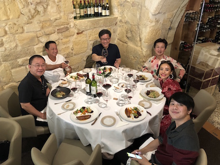 The 2018 Bordeaux Grand Cru Harvest Tour II enjoying a lovely lunch in Saint Emilion
