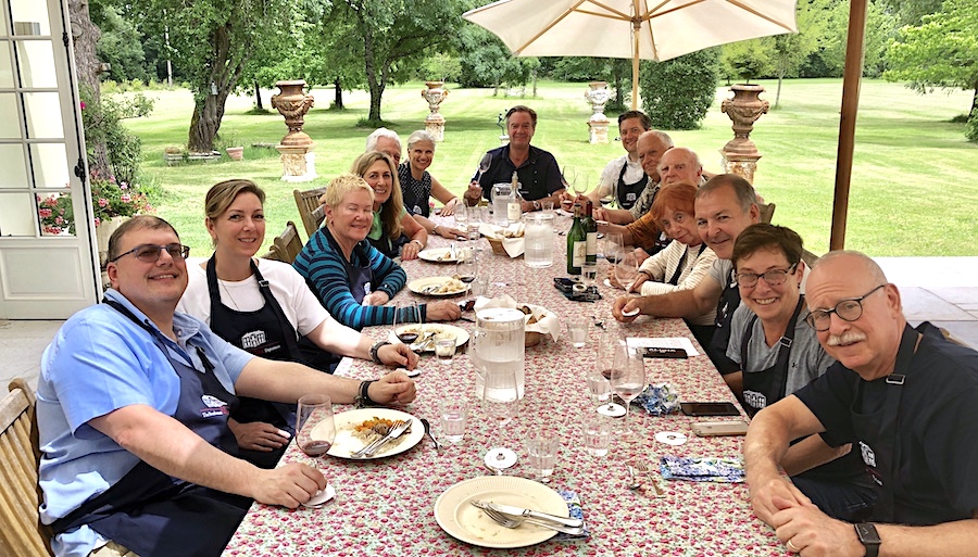 The June 2019 Grand Cru Tour 2 enjoying the cooking experience in the chateau-kitchen